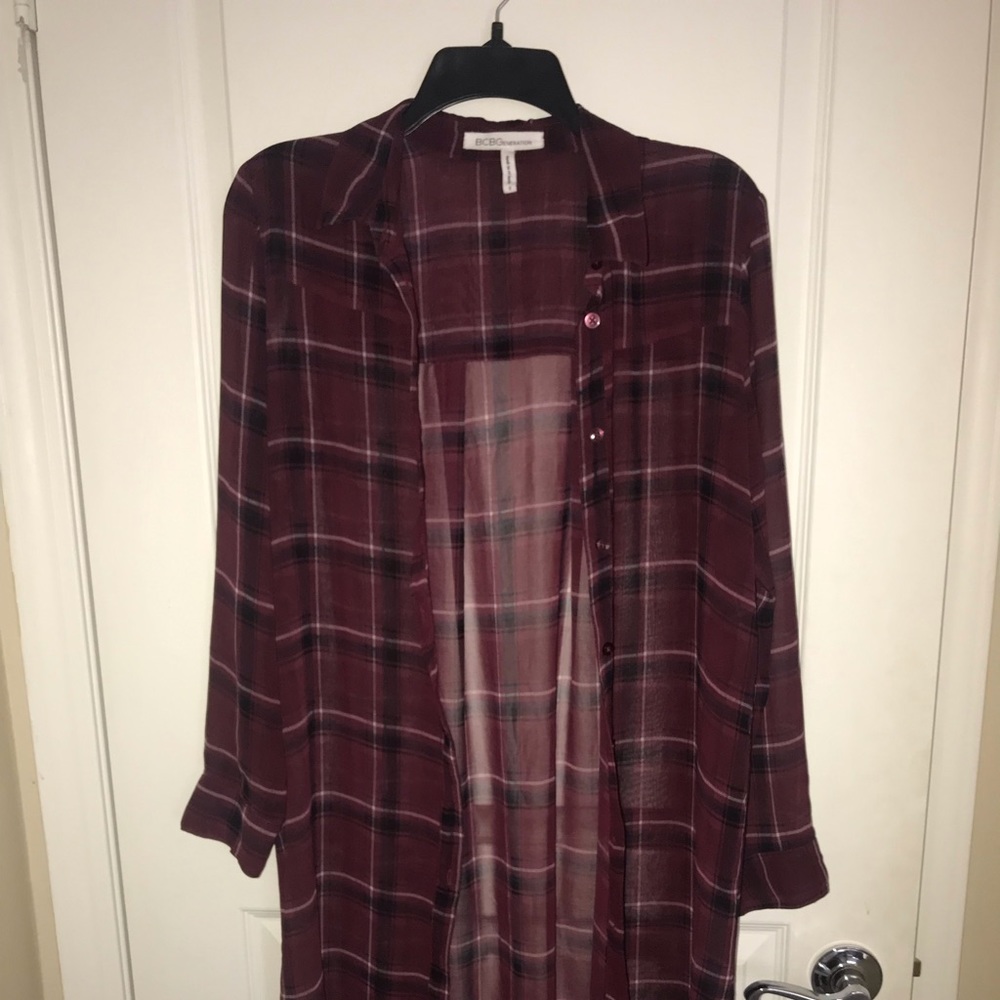 Long button down sheer blouse.